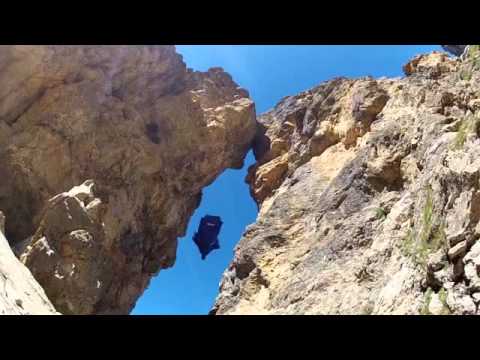 Wingsuit Flight Through 2 Meter Cave Is Intense