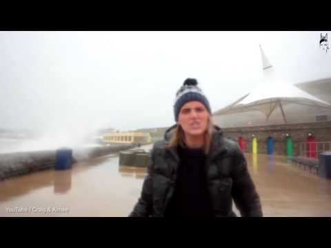 Reporter gets hit by fish! (Funny)