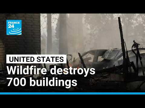 Arson suspected in devastating US wildfire that forced 60,000 to evacuate