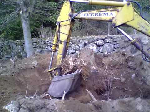 Hydrema 270 / Volvo BM 430 backhoe and a big tree stump