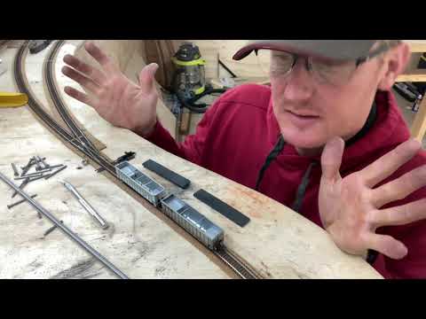 N scale layout update. Tinkering with the coal loads for easy loading and unloading.