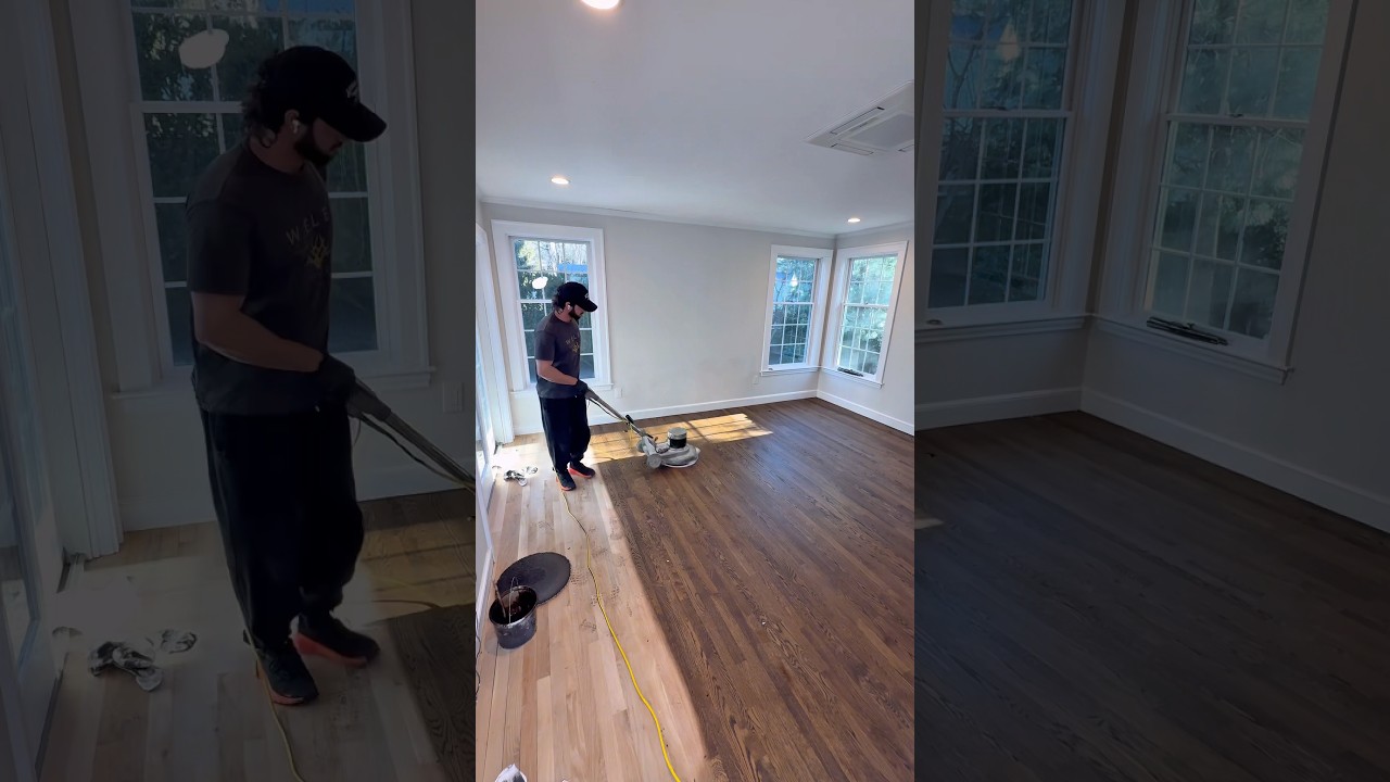 Professional stain application on a prepared hardwood floor