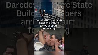 Daredevil Empire State Building climbers arrive at court for hearing