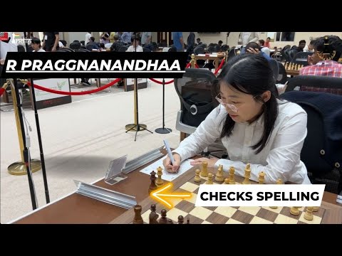 World Champion Ju Wenjun makes sure she writes the correct name of R Praggnanandhaa