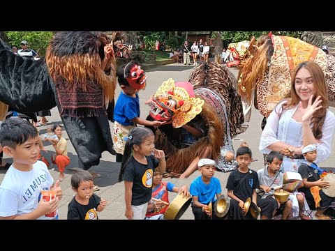 Irvan and his younger brother are riding the Barong Macan with friends.