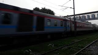 preview picture of video 'Rajdhani Express Overtaking to Manduadih-New Delhi SuperFast Express at Bhaupur Station'