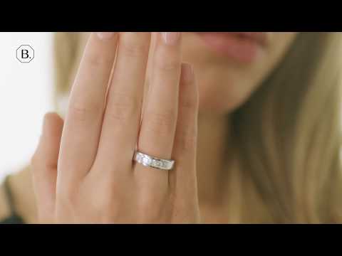 0.75 carat white golden eternity ring with princess diamonds