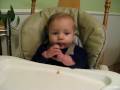 Addie Eating Banana Puffs
