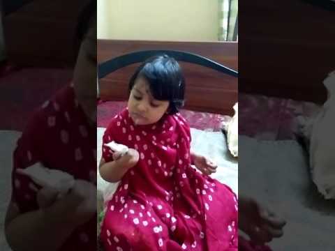 Cute girl licking ice cream