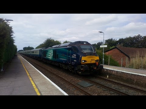 68004 'RAPID' with a rake of MK2s races passes Haring Road