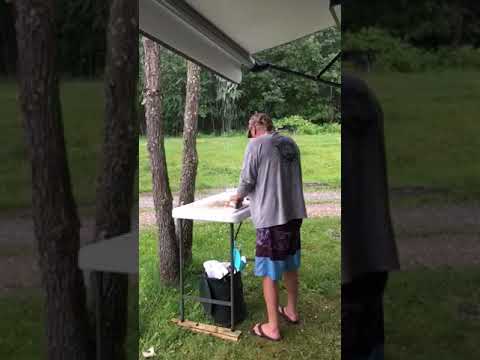 Cleaning fish in the hail