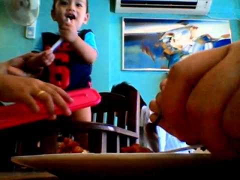 Eating with niqab.....with an active child.