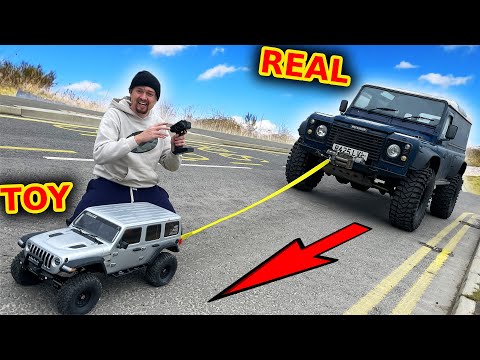 RC Jeep tries to tow a real Jeep