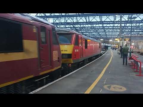 DB 90037 and 90040 head south through Carlisle