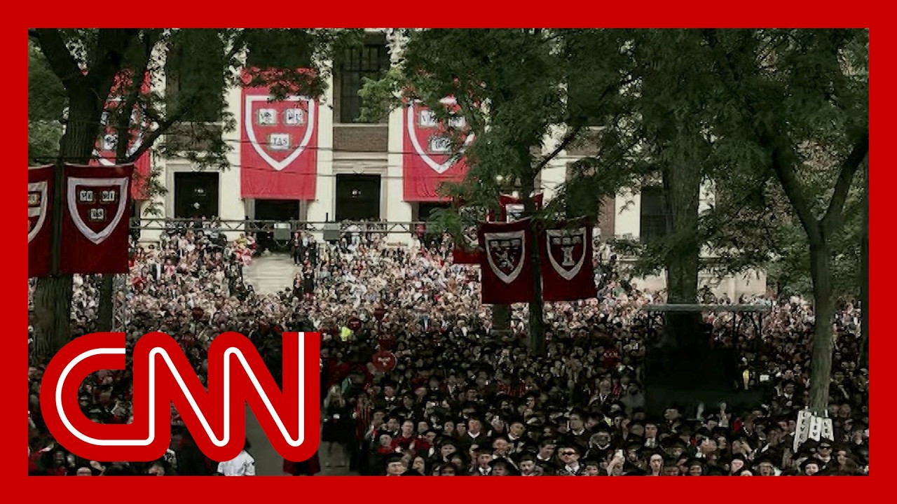 Harvard president gets a minute-long standing ovation as commencement program starts