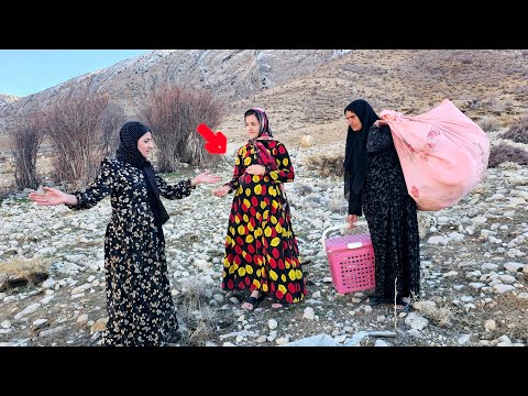 Zulfa helping a pregnant nomadic girl and her mother in the mountains
