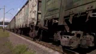 preview picture of video 'Freight train and a tram'