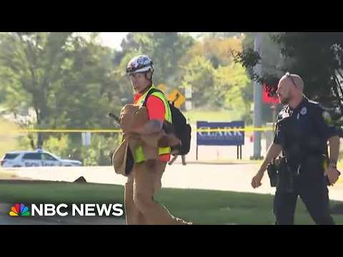 Manhunt underway in Virginia for suspect who shot three coworkers