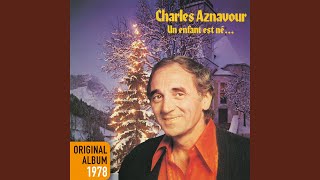 Kadr z teledysku Noël au saloon tekst piosenki Charles Aznavour