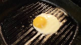 Sticking Test - Cooking eggs in my modern Lodge cast iron grill pan.