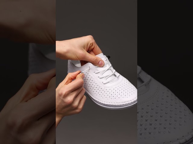 Чоботи жіночі шкіряні байка хутро 592641 Чорний Кеди жіночі шкіряні перфорація 591464 Білі