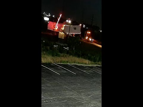 Semi-truck hit by train after getting stuck on the tracks