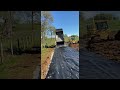 Dump Truck Back Spreading Gravel || ViralHog