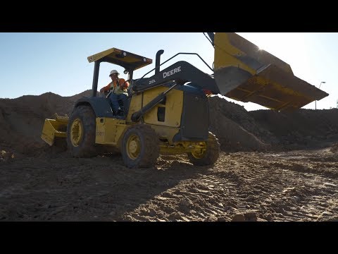 Paving the Way | John Deere  210L and 210L EP Tractor Loaders