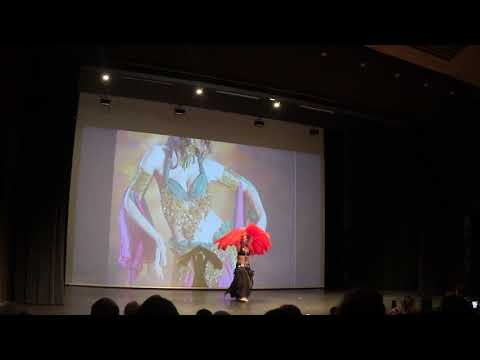 Belly dance with feather fans