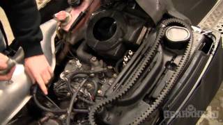 How to change a spark plug on a snowmobile