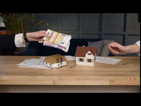 close up shot of female clients hands giving money to her female realtor to