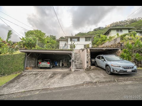 Recently Renovated 2BR/1BA/2 tandem PKG (covered & uncovered) in Kalihi Valley! property video