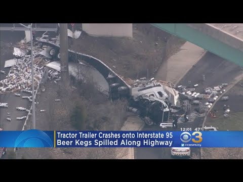 Huge Rig Falls Off Overpass & Spills Kegs All Over Highway