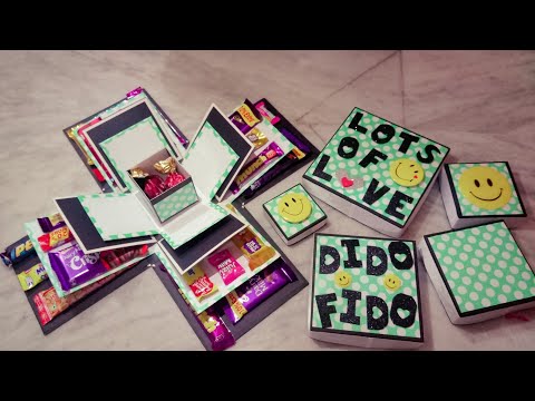 Chocolate explosion box.... Explosion box with lots of chocolates and pics .🎁🍫🍬♥️