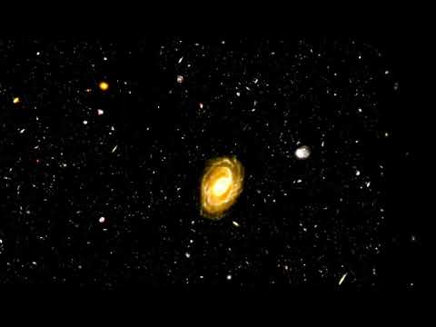 NGC 4414, a typical  in diameter and approximately 60 million light-years from Earth.