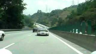 preview picture of video 'RX7 FD and Porsche 911 - Cruising in Genting Highlands'