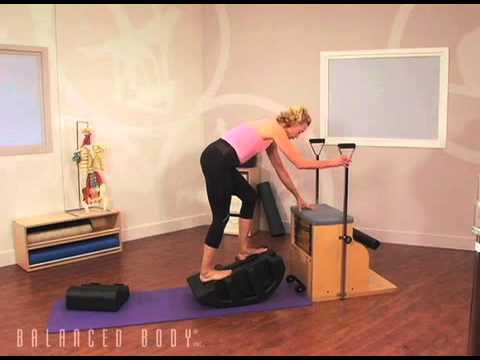 תרגילי שיווי משקל על קשת פילאטיס