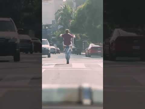 Danny Duncan wheelies a randoms dirtbike