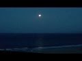 Lunar Eclipse, Earth Shadow on Moon Over Ocean ...