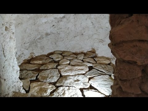 Laying a solid stone floor in the old cave - 150 year old Finca restoration in Spain