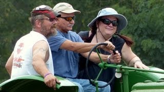 Dad drives a tractor 2013 Rock River Thresheree