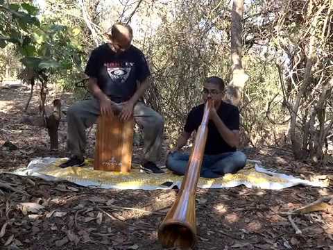 Didgeridoo and Cajon jam in the forest.