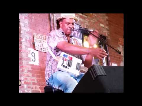 Earl "Guitar" Williams onstage at the 2015 Huntsville Cigar Box Guitar Festival