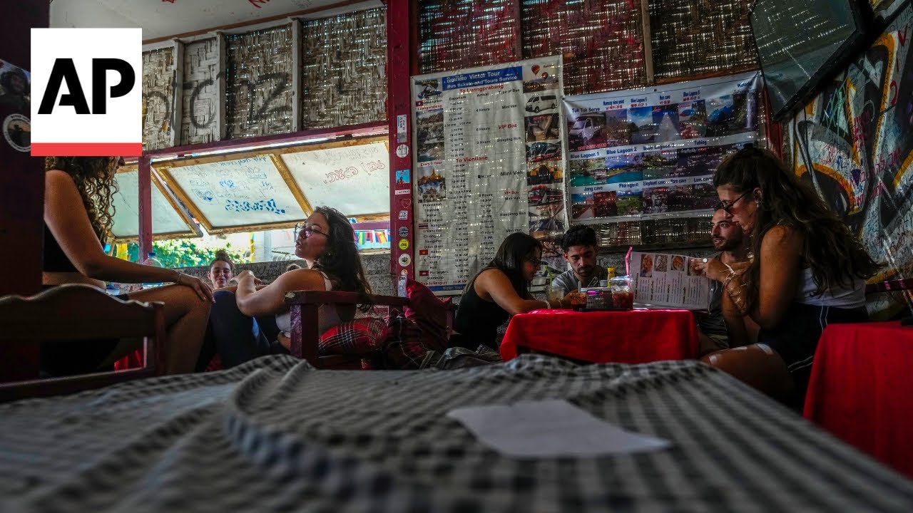 Laotian police detain several people in investigation of tourist deaths in tainted alcohol incident