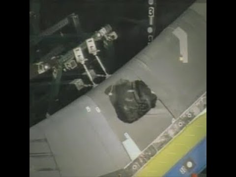 Engineers test foam debris impact to shuttle wing, after the Space Shuttle Columbia disaster, 2004.
