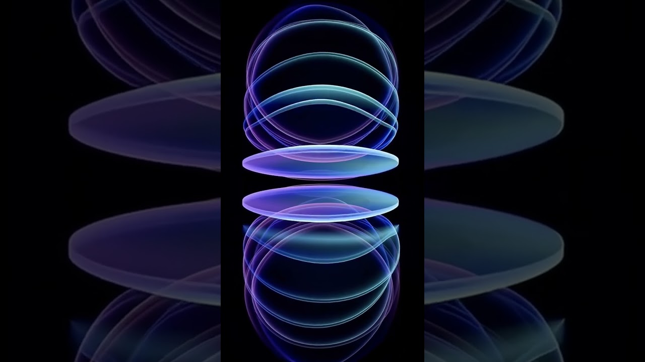 Overlapping oval shapes, with a blue and purple gradient on a black background.