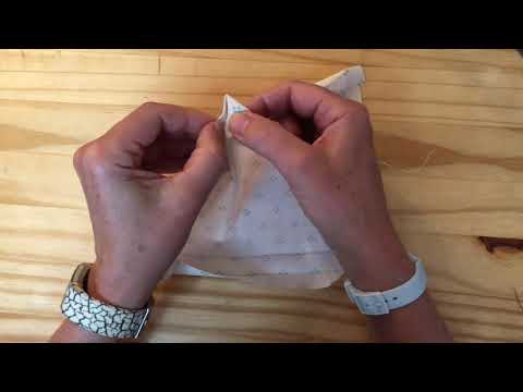 Hand sewn mitred corner