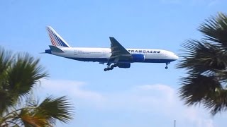Airplane landing over a Mackenzie beach - Larnaca, Cyprus