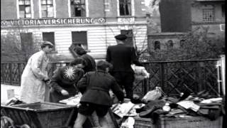 Civilians with looted goods in Nordhausen, Germany. HD Stock Footage