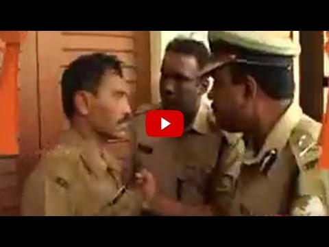 TP Senkumar against Police man at MG College